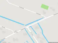Brandweer met gepaste spoed naar de Scheeneweg in Nijeholtwolde vanwege een buitenbrand