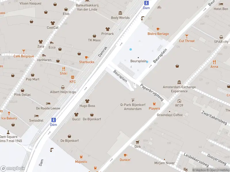 Ambulance met gepaste spoed naar de Beursplein in Amsterdam