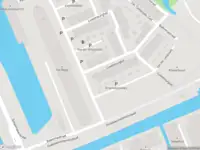 Ambulance met grote spoed naar de Delftechpark in Delft
