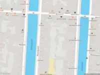 Ambulance met gepaste spoed naar de Reestraat in Amsterdam