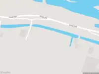 Ambulance met grote spoed naar de Slingerdijk in Oterleek