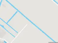 Ambulance en brandweer met grote spoed naar de IJsseldijk-Noord in Ouderkerk aan den IJssel vanwege grote brand