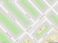 Ambulance met gepaste spoed naar de Newtonstraat in Amsterdam