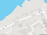 Ambulance met grote spoed naar de Dorpsstraat in Streefkerk