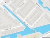 Ambulance met grote spoed naar de Veenwortelstraat in Rotterdam