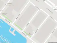 Ambulance met gepaste spoed naar de Plotterstraat in Amsterdam