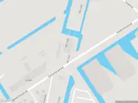 Ambulance met grote spoed naar de Kleiweg in Rotterdam