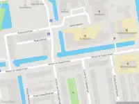 Ambulance met grote spoed naar de Burgvlietkade in Gouda