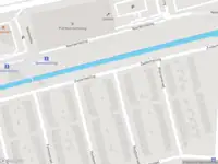 Ambulance met gepaste spoed naar de Rugbystraat in Rotterdam