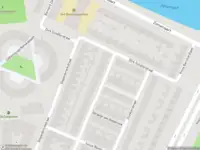 Ambulance met gepaste spoed naar de Dunklerstraat in Haarlem