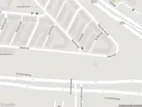 Ambulance met gepaste spoed naar de Aakstraat in Rotterdam