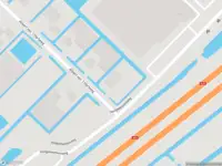 Ambulance met grote spoed naar de Albert van 't Hartweg in Nieuwerkerk aan den IJssel