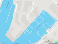 Ambulance met grote spoed naar de Stationsplein in Hellevoetsluis