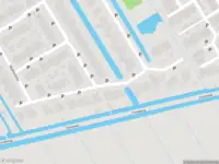 Ambulance met grote spoed naar de Waterlelie in Nieuw-Lekkerland