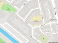 Ambulance met grote spoed naar de Rijnstraat in Haarlem