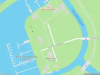 Ambulance met grote spoed naar de Christoffel Plantijngracht in Amsterdam