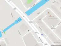 Ambulance met gepaste spoed naar de Julianaplein in Amsterdam
