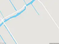 Politie naar de Googweg in Muiderberg vanwege voertuigen te water