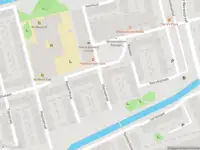 Ambulance met gepaste spoed naar de Ghanastraat in Delft