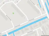 Ambulance met grote spoed naar de Frederik van Eedenplaats in Capelle aan den IJssel