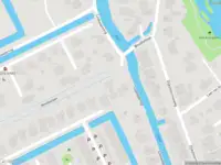 Ambulance met gepaste spoed naar de Woudselaan in Delft
