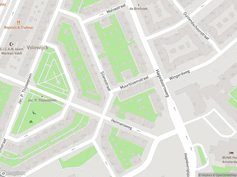 Ambulance met grote spoed naar de Muurbloemstraat in Amsterdam