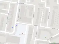 Ambulance met gepaste spoed naar de Leibnizstraat in Amsterdam