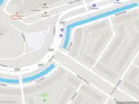 Ambulance met grote spoed naar de Eurokade in Amsterdam