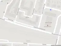 Ambulance met grote spoed naar de Burgemeester de Raadtsingel in Dordrecht