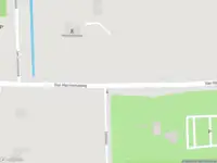 Brandweer met grote spoed naar de Van Harinxmaweg in Beetsterzwaag vanwege afhijsen patient