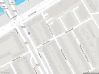 Ambulance met gepaste spoed naar de Talmastraat in Rotterdam
