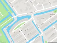 Ambulance met gepaste spoed naar de Waterloop in Delft