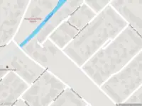 Ambulance met grote spoed naar de Willem van Gulikstraat in Baarlo