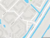 Ambulance met grote spoed naar de Lelieveld in Nieuwerkerk aan den IJssel
