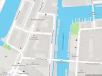 Brandweer met grote spoed naar de Nieuwe Teertuinen in Amsterdam