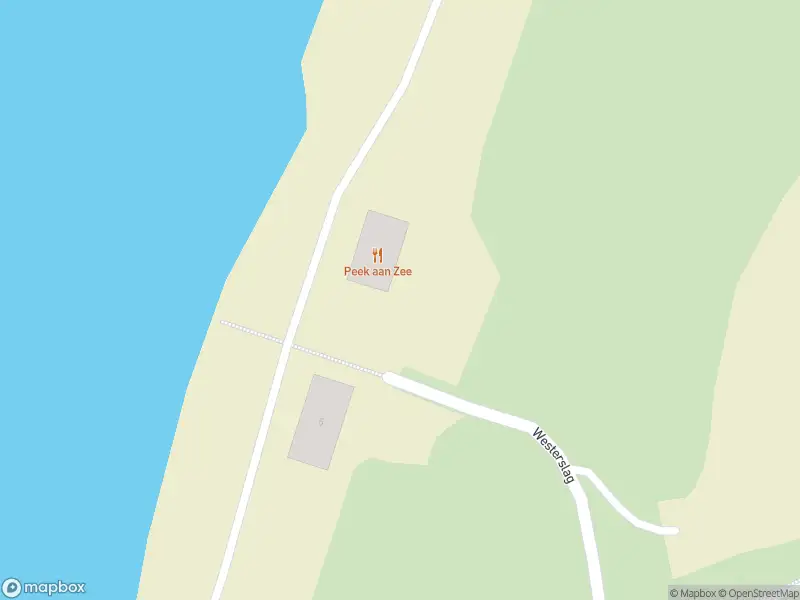 Ambulance met grote spoed naar de Westerslag in Den Burg