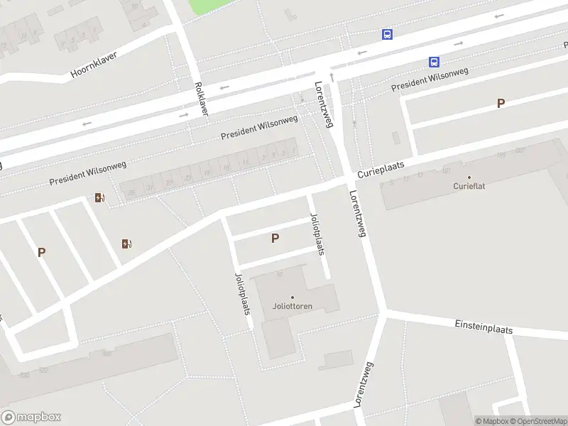 Ambulance met grote spoed naar de Joliotplaats in Rotterdam