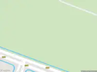 Brandweer met gepaste spoed naar de Vossenbergseweg in Tilburg vanwege een buitenbrand
