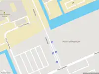 Brandweer met gepaste spoed naar de Kluyverweg in Delft vanwege afgaan automatisch brandalarm