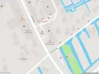 Ambulance met grote spoed naar de Kanaalweg in Capelle aan den IJssel