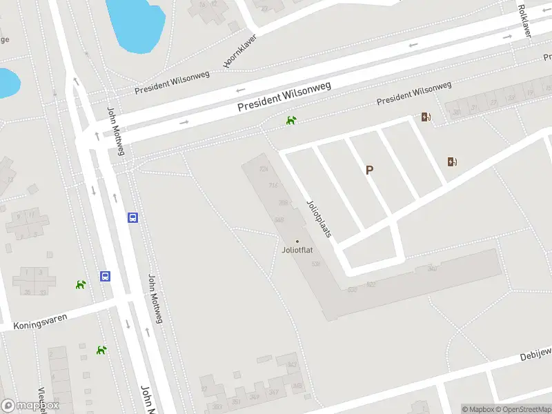Ambulance met grote spoed naar de Joliotplaats in Rotterdam