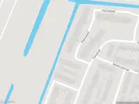 Ambulance met grote spoed naar de Klaproosveld in Krimpen aan de Lek