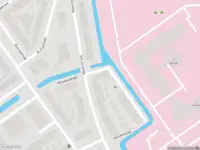 Ambulance met grote spoed naar de Ramaerstraat in Delft