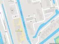 Ambulance met grote spoed naar de Akkerwinde in Capelle aan den IJssel