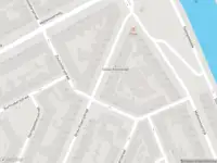Ambulance met grote spoed naar de Grote Visserijstraat in Rotterdam