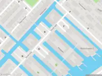 Ambulance met grote spoed naar de Mieogvaart in 's-Gravenhage