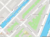 Ambulance met grote spoed naar de Eerste Nassaustraat in Amsterdam