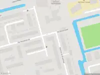 Ambulance met grote spoed naar de Van Bassenstraat in Rotterdam