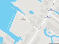 Ambulance met grote spoed naar de Molenwerf in Rotterdam