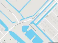 Ambulance met grote spoed naar de Raasdorperweg in Amsterdam